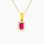 Emerald cut ruby and cubic zirconia halo pendant in yellow gold