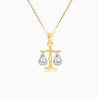 Golden pendant of the sign of Libra