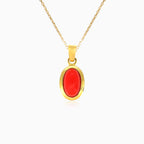 Yellow gold natural red coral oval pendant