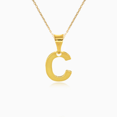 Gold pendant of letter "C"