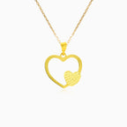 Yellow gold open heart and puffed heart pendant