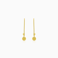 Unique gold earrings with a coin