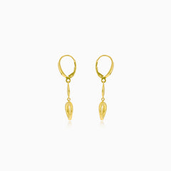 Gold dangling earrings with a circle and a coin