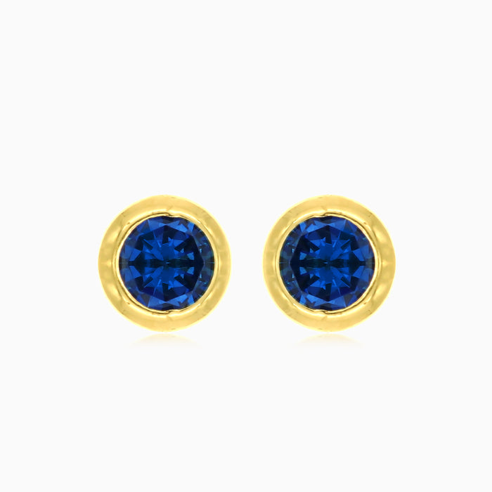 Boucles d’oreilles puces en saphir bleu en or jaune