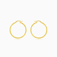 Circular yellow gold earrings