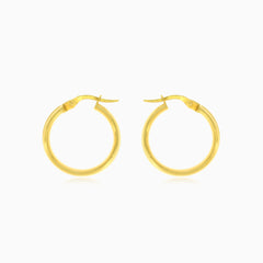Thick yellow gold high polished hoop earrings