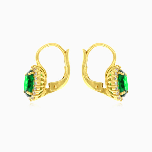 Oval cut emerald halo earrings