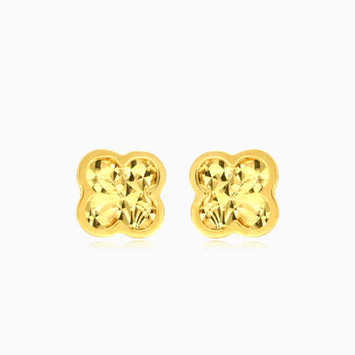 Symbolic yellow gold stud earrings