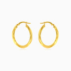 Yellow gold oval hoop earrings