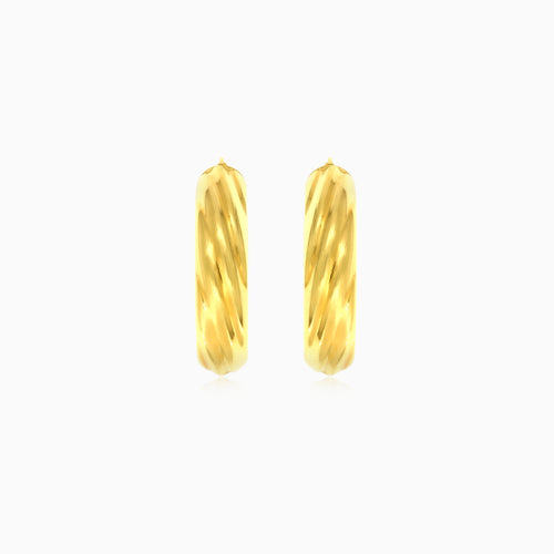 Yellow gold oval hoop earrings
