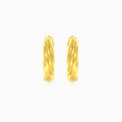 Yellow gold oval hoop earrings