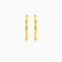 Twisted yellow gold hoop earrings