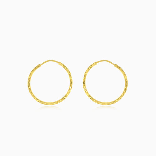 Zlaté kruhové náušnice s diamantovým brusem