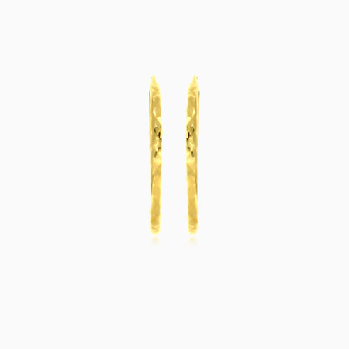 Diamond-cut gold hoop earrings