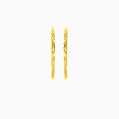 Diamond-cut gold hoop earrings