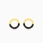Yellow gold black onyx circle earrings