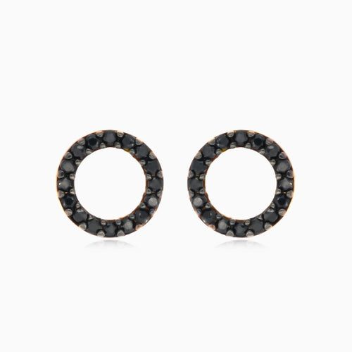 Yellow gold circle earrings with black onyx