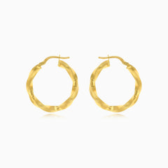 Curved yellow gold earrings