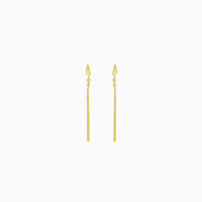 Delicate gold dangle earrings with chains