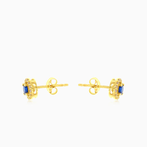 Round cut blue sapphire yellow gold earrings