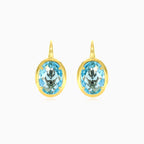 Oval blue topaz gold earrings