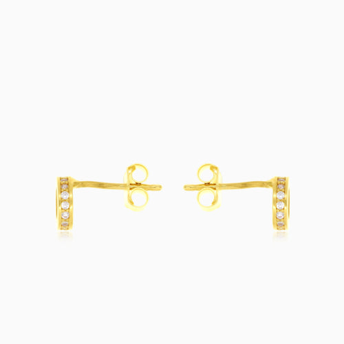 Yellow gold round frame cubic zirconia stud earrings