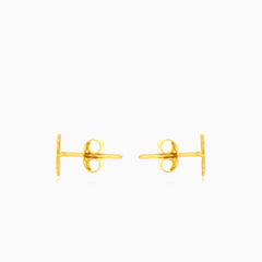 Lustrous yellow gold infinity stud earrings