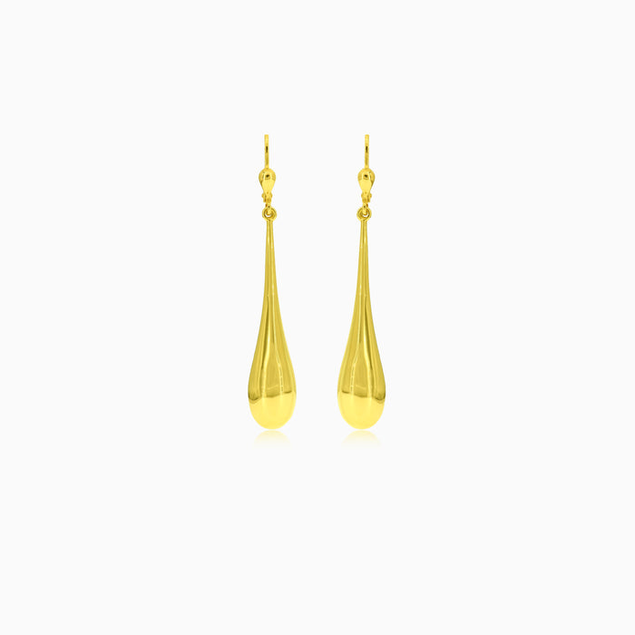 Pendientes largos dramáticos en oro amarillo