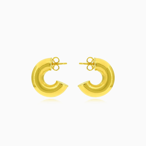 Massive ladies round earrings in yellow gold