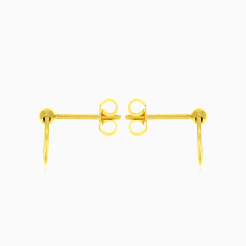 Yellow gold circle ball hoop earring