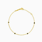 Gold chain bracelet with onyxes