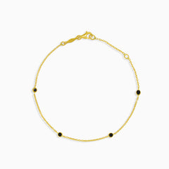 Gold chain bracelet with onyxes