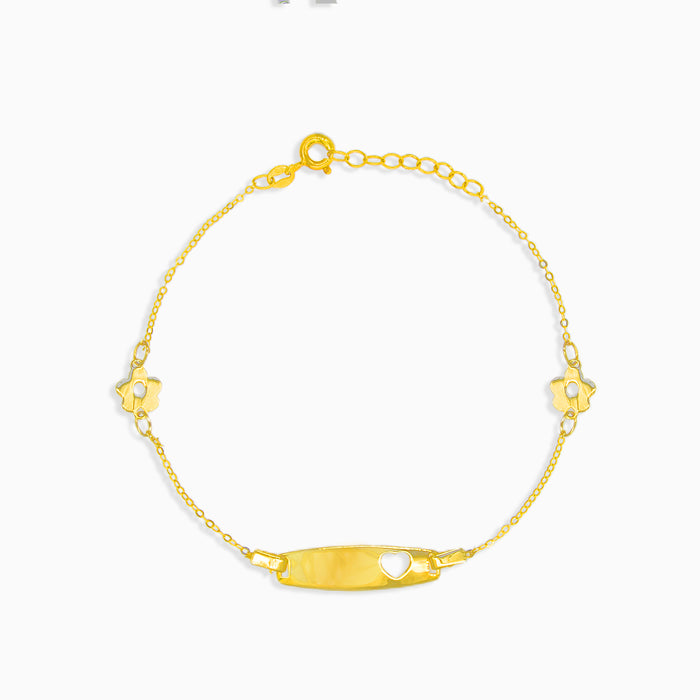 Pulsera de oro con detalles de flores y placa central