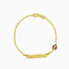 Gold bracelet with ladybug and central plate