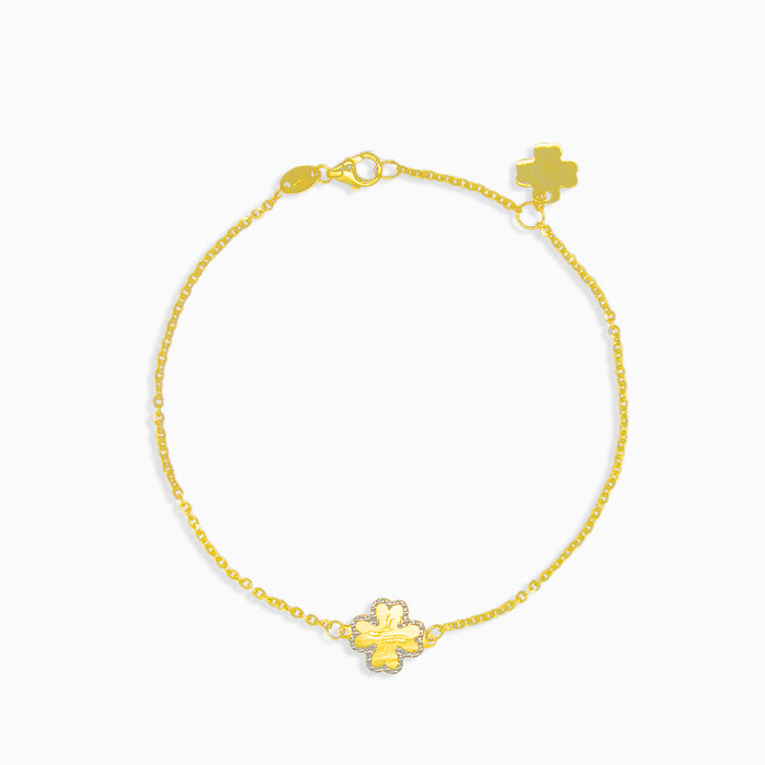 Gold bracelet with clover leaf