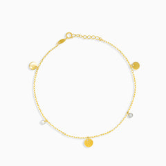 Gold dangling bracelet with zircons