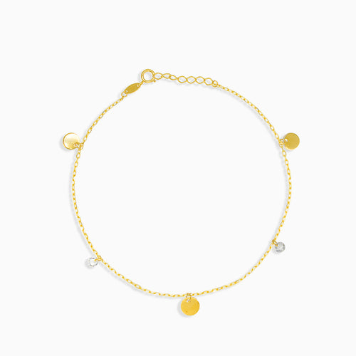 Gold dangling bracelet with zircons