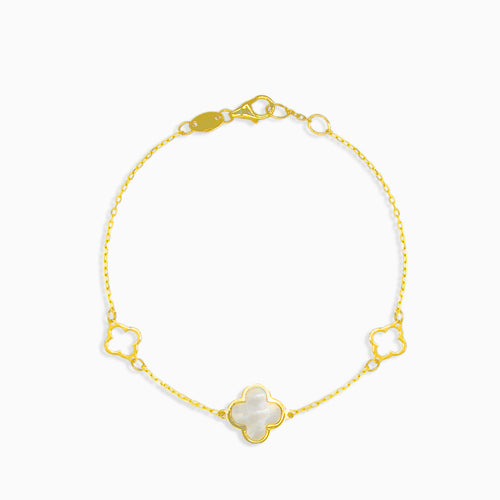 Gold bracelet with mother pearl clover leaf