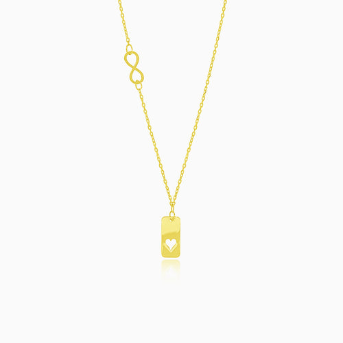 Gold necklace with heart symbol