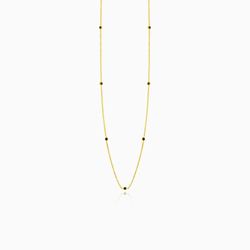 Zlatý náhrdelník s černými onyxy