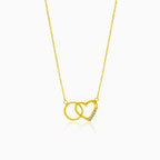 Gold necklace with heart and ring