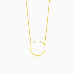 Modern gold necklace with a circle