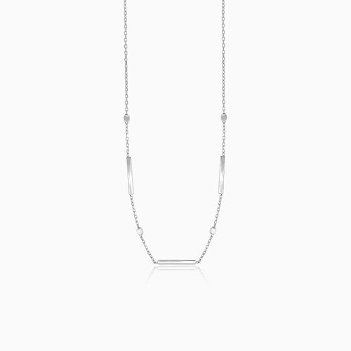 Minimalist necklace in white gold with balls and plate