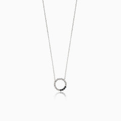 Elegant white gold necklace with a circle of onyx balls