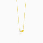 Minimalist gold necklace with a pearl