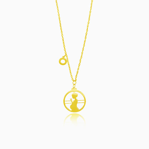 Gold necklace with pregnant woman silhouette