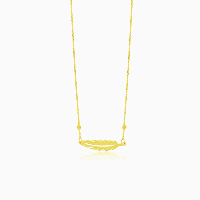 Gold necklace with feather