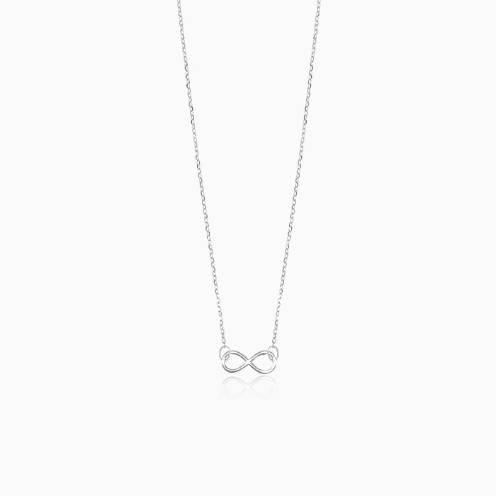 Simple white gold necklace with infinity symbol