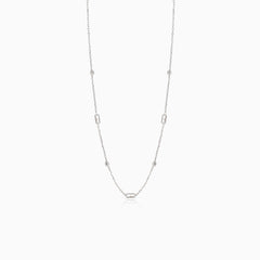 Fine necklace in white gold with balls and emerald cut zircons