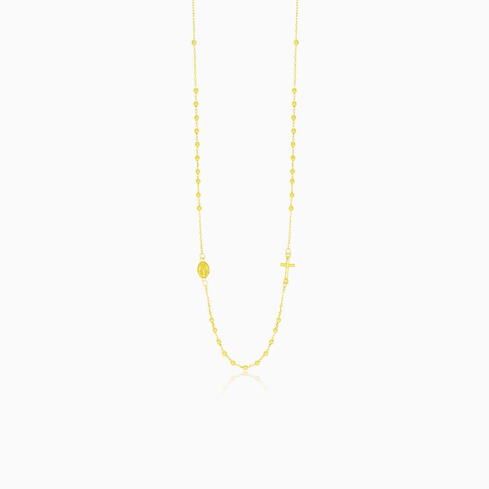 Tiny gold rosary with beads